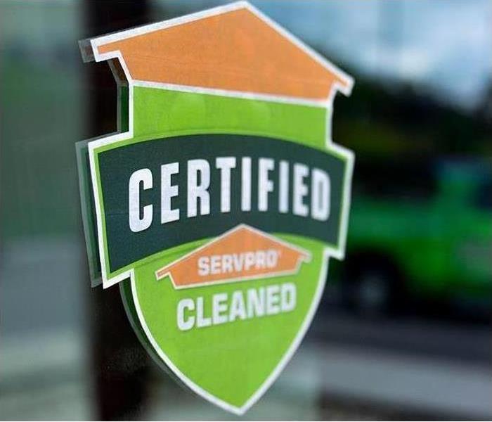 Certified: Servpro Cleaned seal on window 